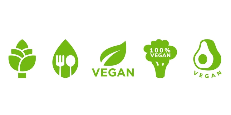 Vector conjunto de iconos verdes veganos y ecológicos que incluyen hojas de brócoli de aguacate y cubiertos