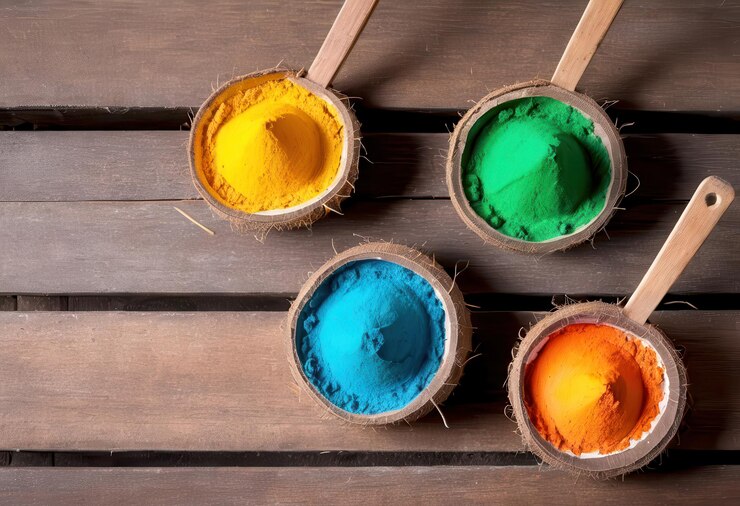 Vector un conjunto de pinceles de pintura de colores en una mesa de madera