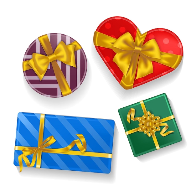 Un conjunto de regalos realistas en diferentes formas atados con cintas doradas.