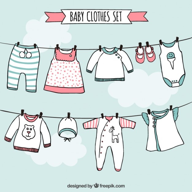 Vector conjunto de ropa de bebé en estilo dibujado a mano