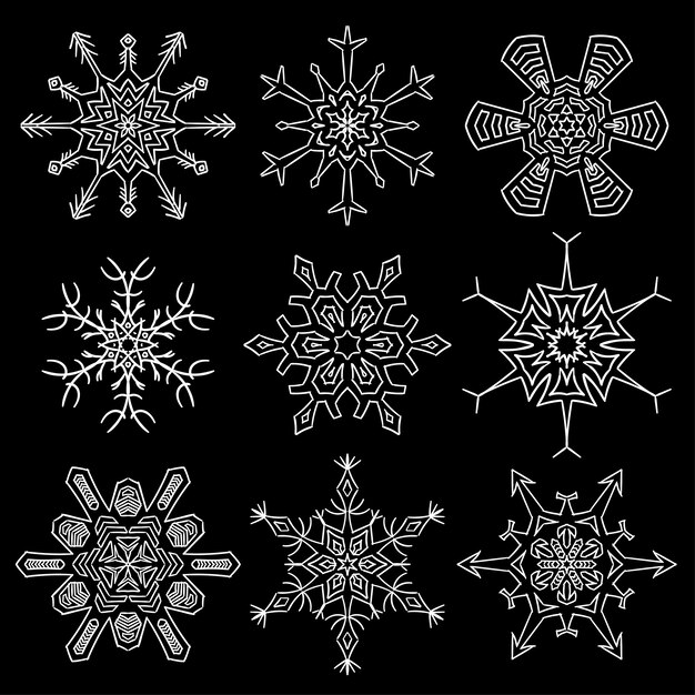 Conjunto de siluetas de copos de nieve dibujados