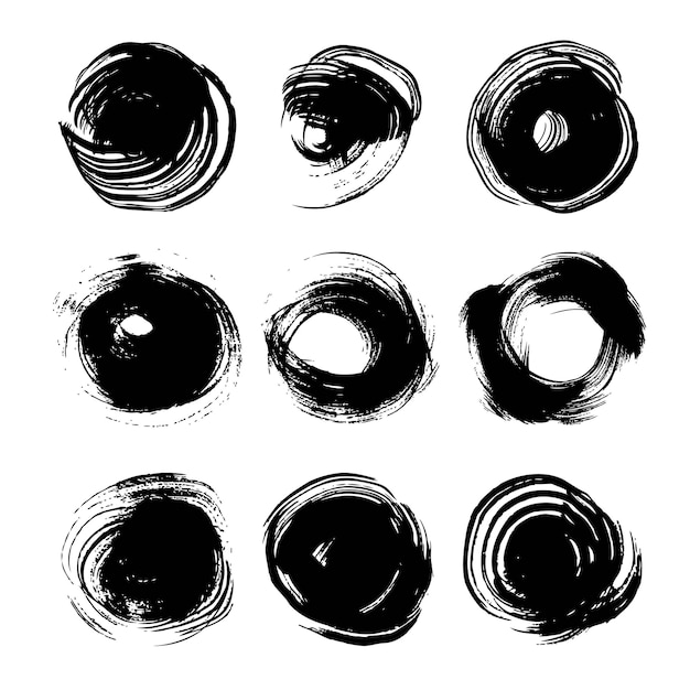 Conjunto de trazos de tinta redondos negros grandes abstractos aislado en un fondo blanco