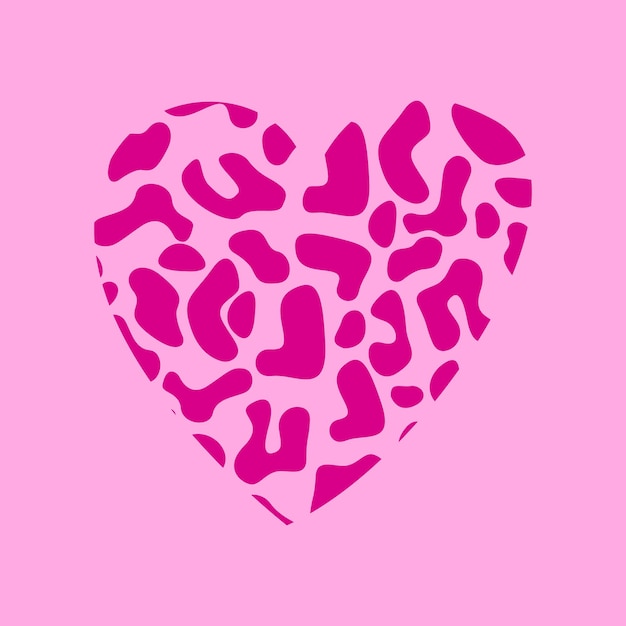 Corazón de leopardo sobre fondo rosa