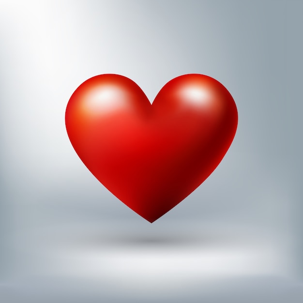 Corazón rojo brillante aislado sobre fondo blanco para el día de San Valentín