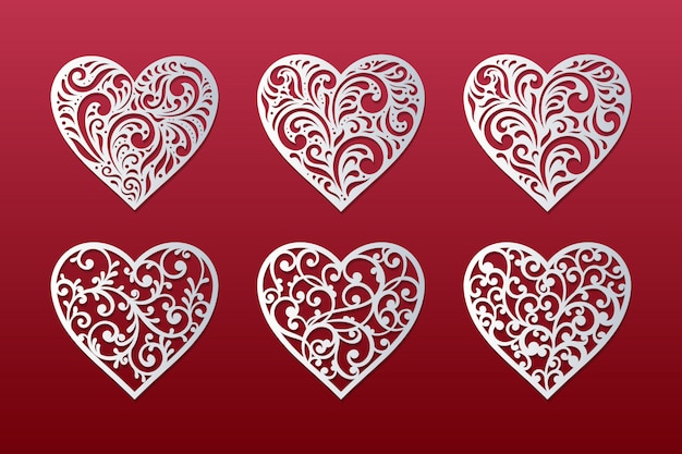 Vector corazones cortados con láser con diseño de corazones florales de encaje