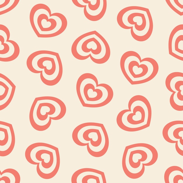 Corazones rojos sobre fondo beige patrón sin costuras vectorial en colores pastel retro suaves