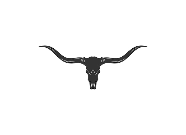 un cráneo de un toro se muestra con una cabeza negra y cuernos