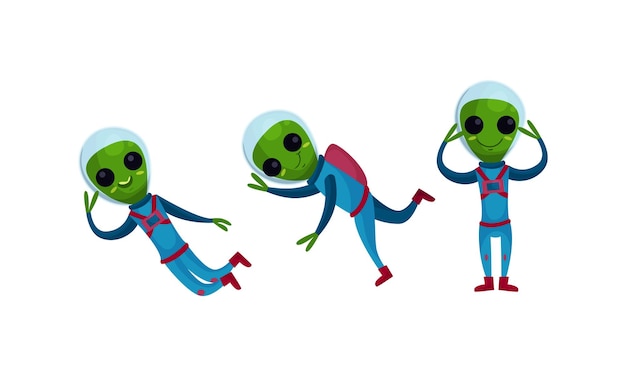 Criaturas alienígenas verdes en traje espacial de pie y agitando la mano conjunto vectorial