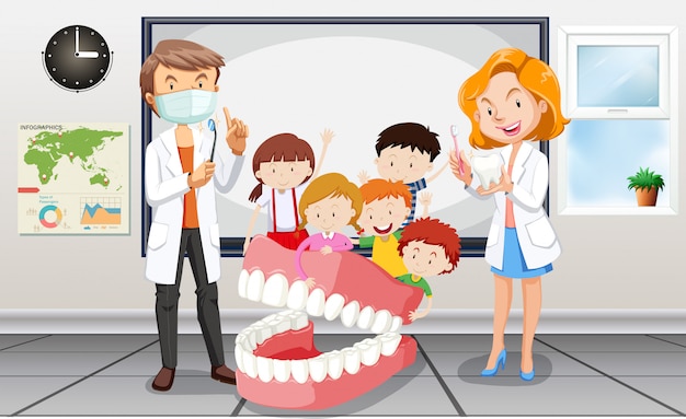 Dentistas y niños en el aula