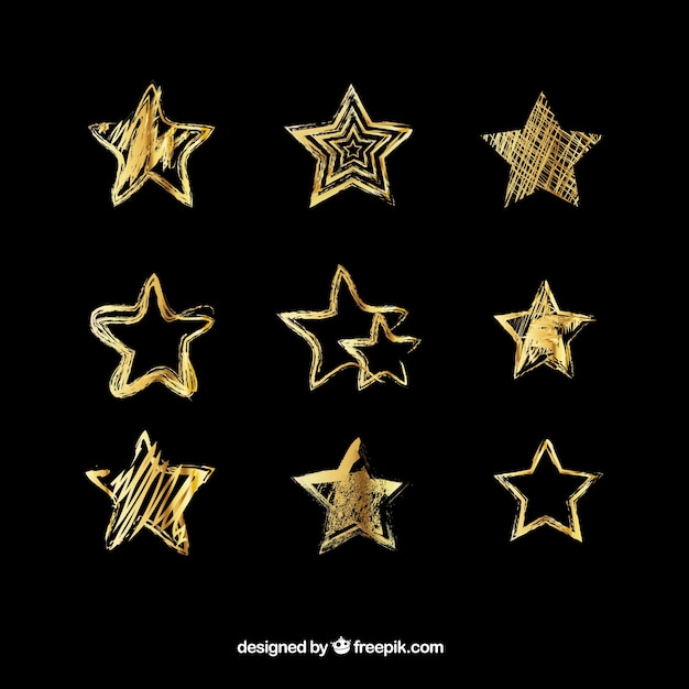 dibujados a mano estrellas de oro fijadas