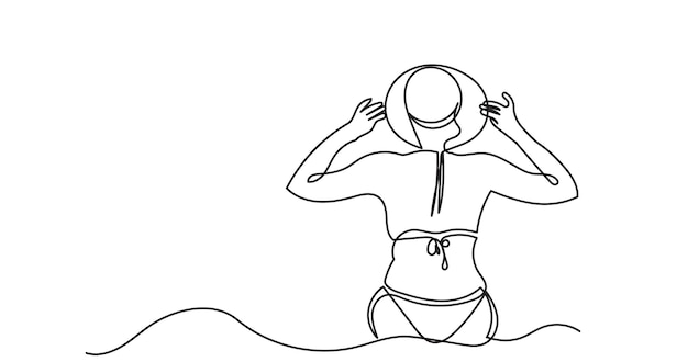 Dibujo en línea continua de una joven esbelta sentada en la playa y sosteniendo un sombrero.