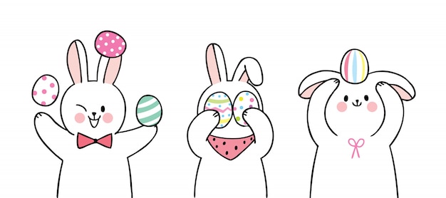 Dibujos animados lindo día de Pascua conejos y coloridos huevos conjunto.