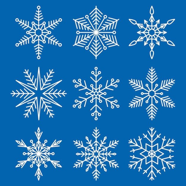 Vector diferentes copos de nieve blancos