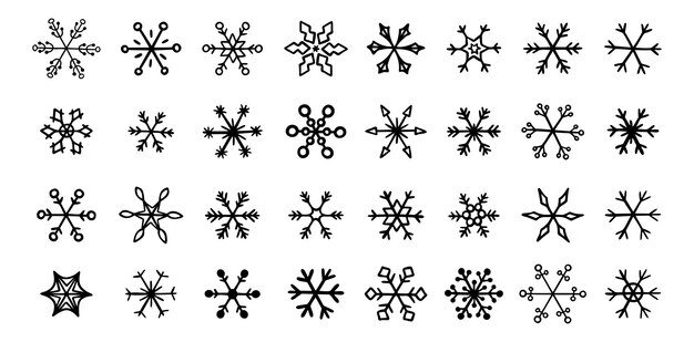 Diferentes iconos de copos de nieve dibujados a mano