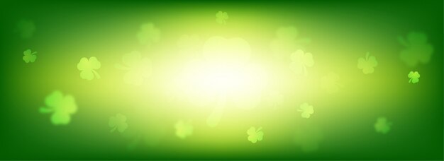 El diseño brillante de la bandera del día de St Patrick feliz adornado con el trébol se va.