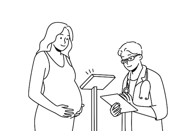El doctor examina a la mujer embarazada en el hospital