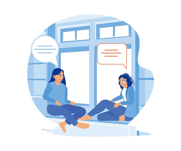 Dos hermosas chicas están sentadas en la ventana en una habitación luminosa conversaron y sonrieron fuera de la ciudad