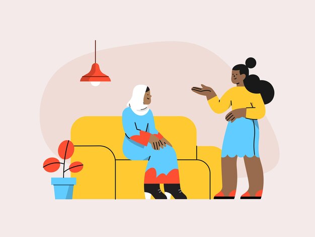 dos mujeres se sientan en un sofá uno de los cuales tiene una planta en él