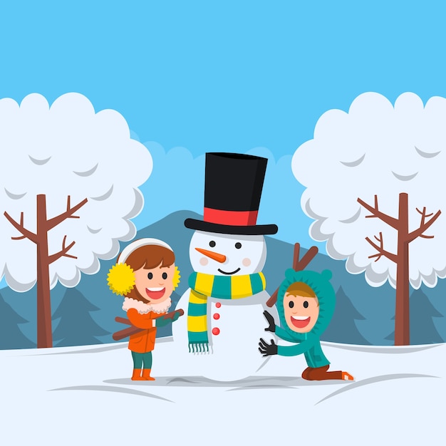 Dos niños felices haciendo muñeco de nieve