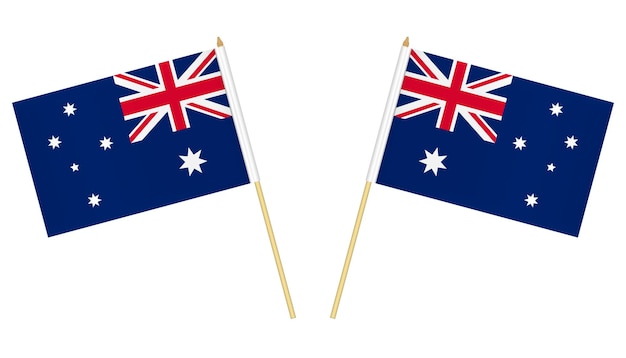 Dos pequeñas banderas australianas aisladas sobre fondo blanco Mini bandera de Australia en el poste
