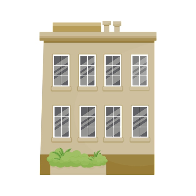 Edificio de la ciudad y un arbusto de vegetación.
