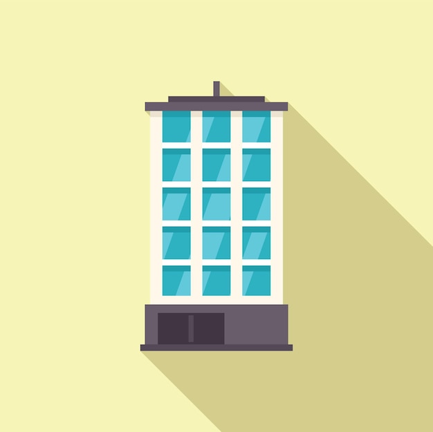 Edificio moderno de la ciudad con ventanas de vidrio que proyectan una larga sombra