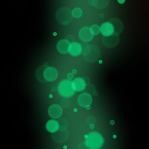 Efecto bokeh Formas borrosas de círculos verdes sobre un fondo negro El efecto del abstracto
