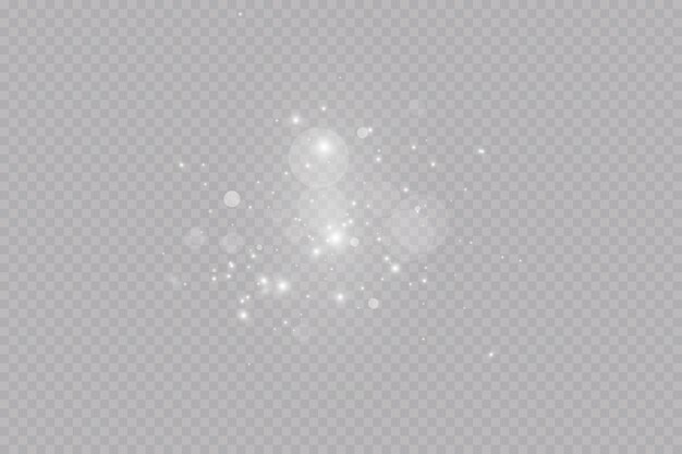 Efecto de luz con partículas de brillo. Polvo de Navidad. Las chispas blancas brillan con luz especial.