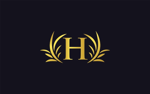 La elegante letra H del logotipo dorado