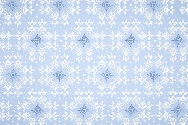 Elegante patrón de invierno con hermosos copos de nieve en un fondo azul suave diseño creativo de nieve