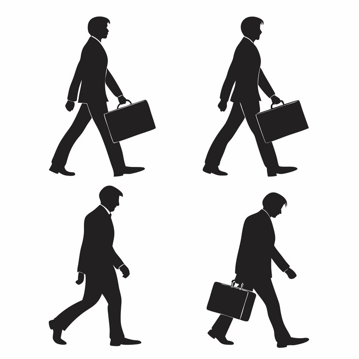 Empresario caminando y llevando un maletín