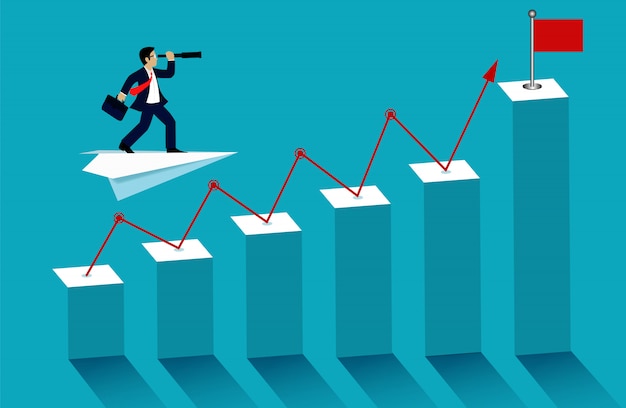 Empresario parado en avión de papel mirando con el binocular en gráfico de barras ir a bandera roja