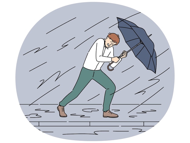 Empresario con paraguas para protegerse de la tormenta