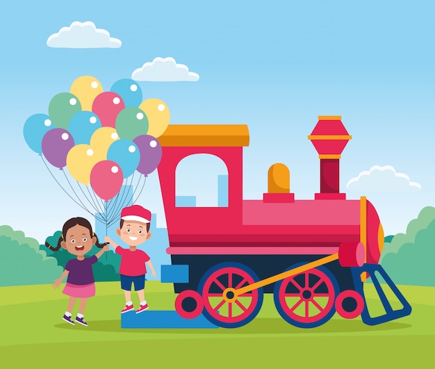 Entrenar y niños felices con globos de colores en el campo