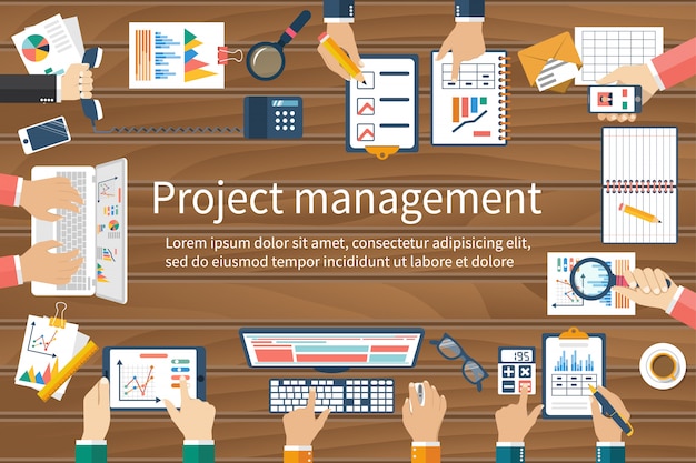 Equipo de negocios manos en mesa con documentos