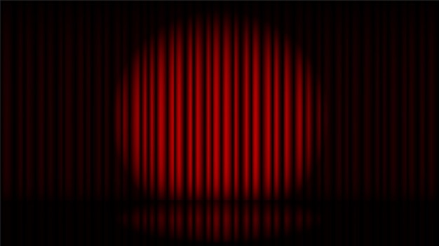 Escenario con cortina roja y foco.