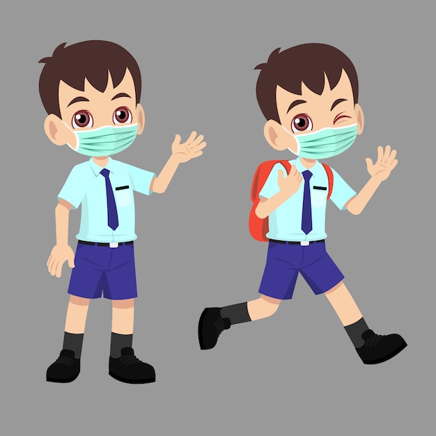 Escolar en uniforme de regreso a la escuela con mascarilla y saludó.