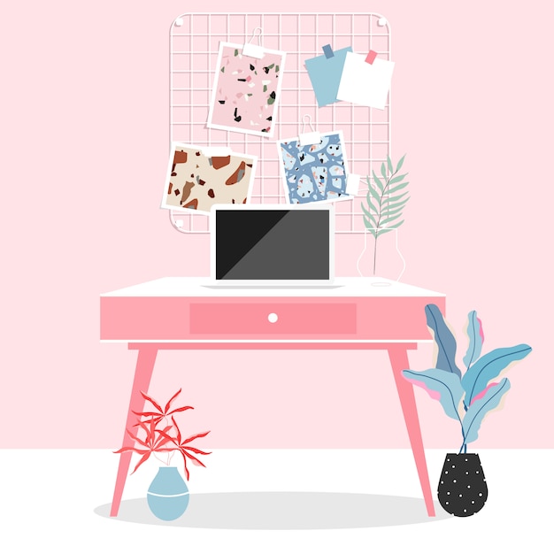 Espacio de trabajo en casa. habitación rosa interior. trabajando desde casa durante el aislamiento. portátil sobre la mesa. escritorio de trabajo rosa, tarjeta de memoria en la pared y plantas. vida moderna y diseño interior moderno.