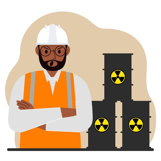 Un especialista masculino junto a barriles negros con una imagen que advierte sobre la toxicidad de los desechos Radiación