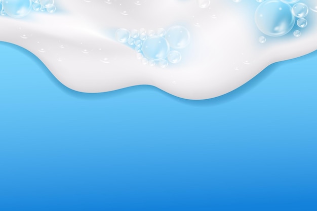 Espuma de baño aislada sobre fondo azul. Textura de burbujas de champú.