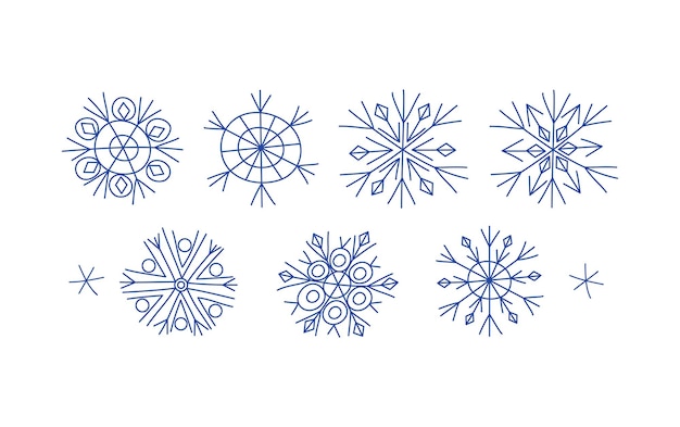 Vector establecer copos de nieve doodle