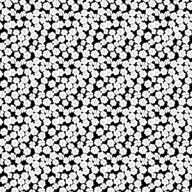 estampado de flores en blanco y negro sobre un fondo negro