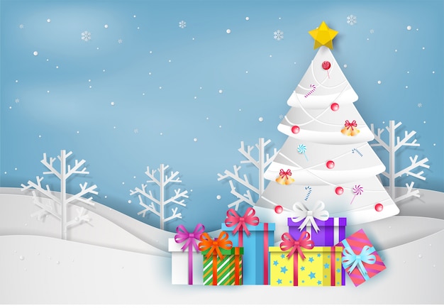 Estilo de arte en papel del árbol de Navidad y caja de regalo colorida en invierno con paisaje backgroun