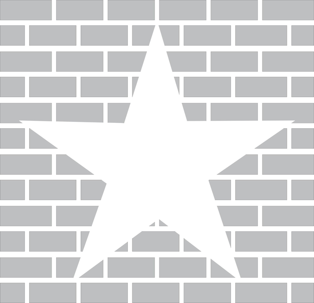 Una estrella blanca en una pared de ladrillo gris
