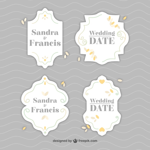 Vector etiquetas de boda con elementos ornamentales