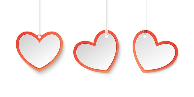 Etiquetas rojas y blancas del corazón para el tema del amor en el estilo de papel.