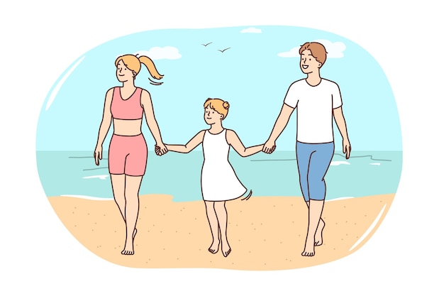 Familia feliz con niño en la playa