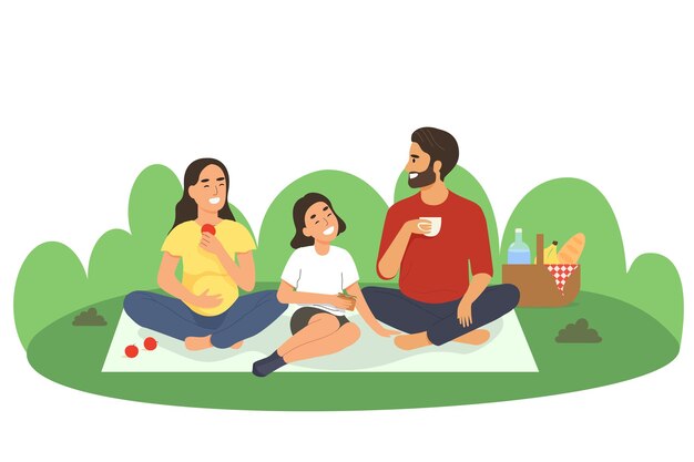 Familia feliz en un picnic en la naturaleza