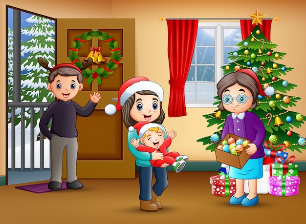 Familia feliz en la sala de estar con el árbol de navidad