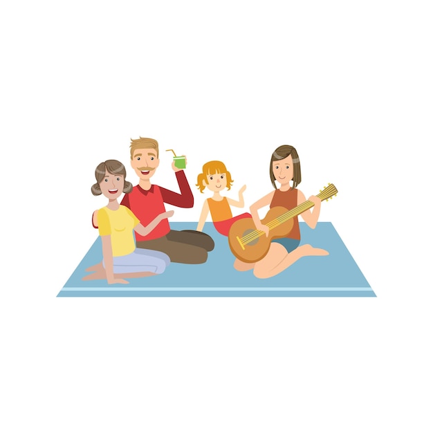 Familia de picnic con guitarra